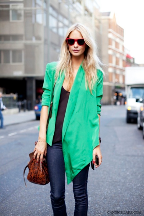 Bright green asymmetrical jacket,Mulberry leopard bag and red ray ban sunglasses